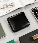 Poręczna, czarna skórzana portfel-portmonetka damska. Suwak. RFID.