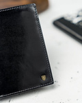 Elegancki skórzany portfel męski. Czarny. Ochrona RFID