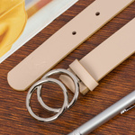 Beżowy pasek damski skórzany ze srebrną okrągłą klamrą