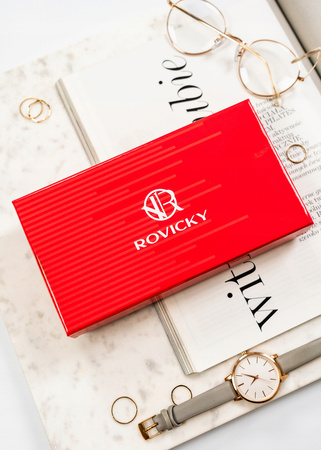 Duży portfel damski brązowy w kwiaty, pionowy - skóra ekologiczna