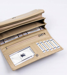 Duży pikowany skórzany portfel damski beżowy. Zatrzask.